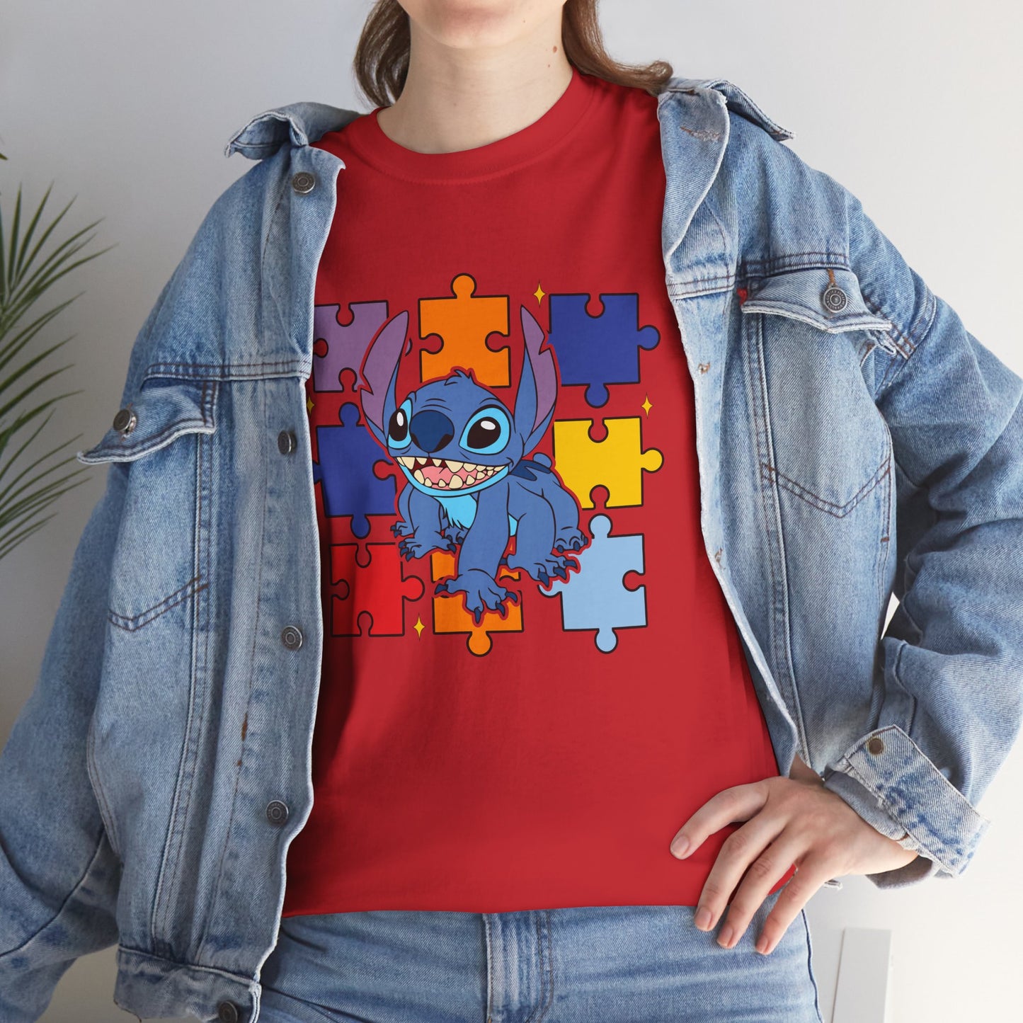 Puzzle Pieces Tee — Cute Blue Alien Character on Colorful Autism Puzzle Background