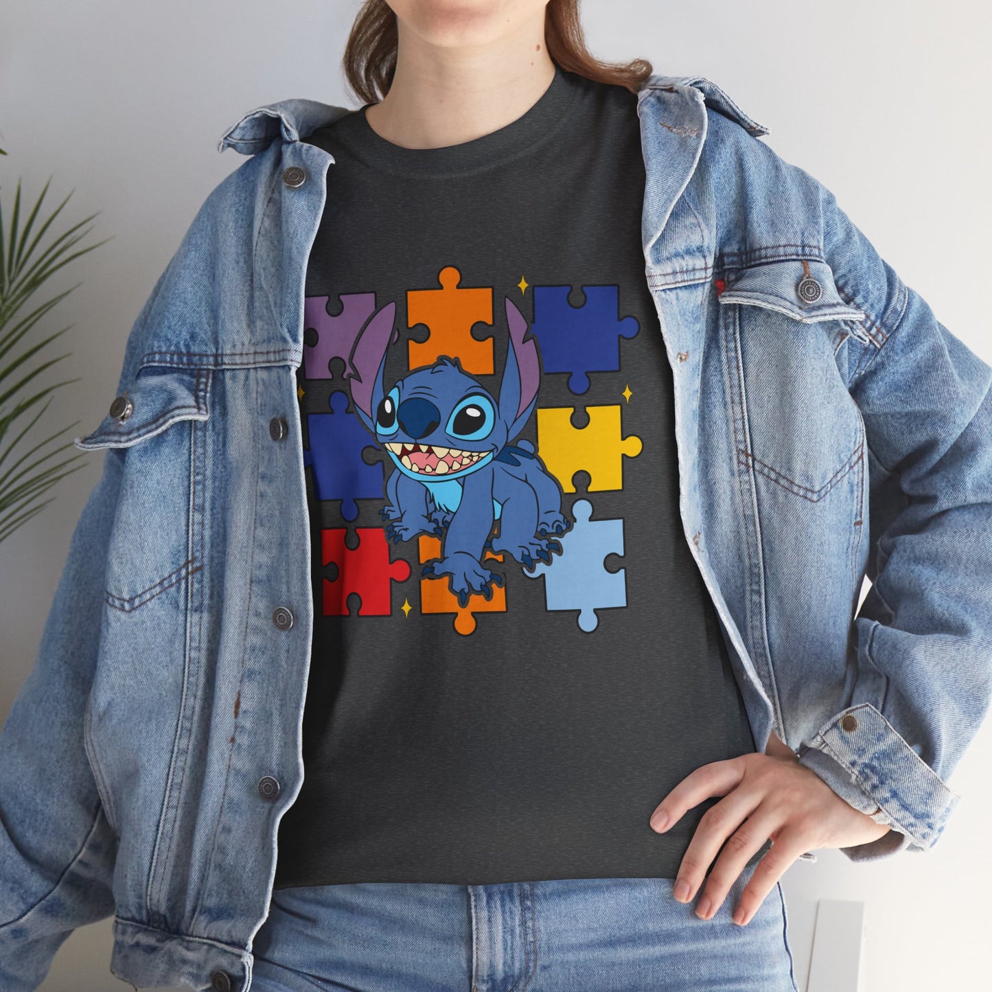Puzzle Pieces Tee — Cute Blue Alien Character on Colorful Autism Puzzle Background
