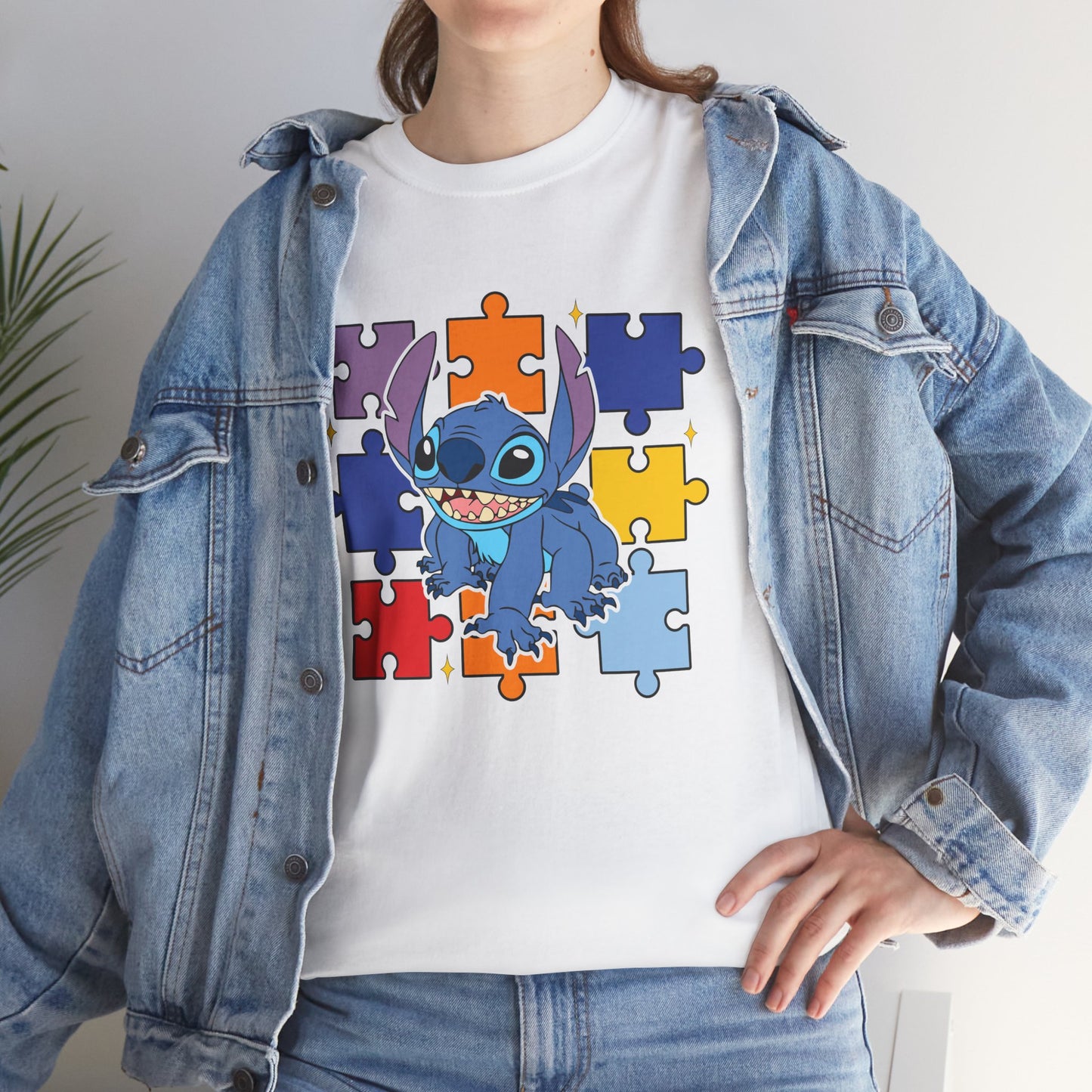 Puzzle Pieces Tee — Cute Blue Alien Character on Colorful Autism Puzzle Background