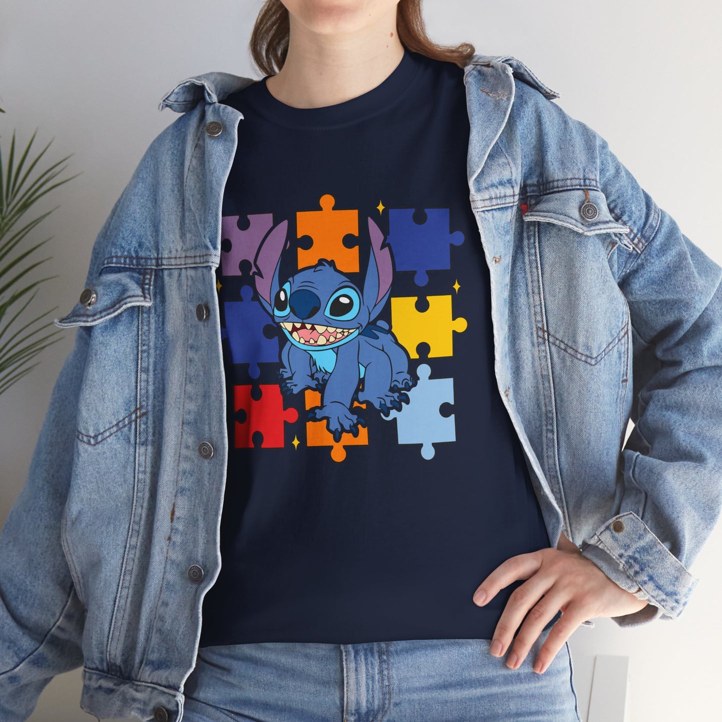 Puzzle Pieces Tee — Cute Blue Alien Character on Colorful Autism Puzzle Background