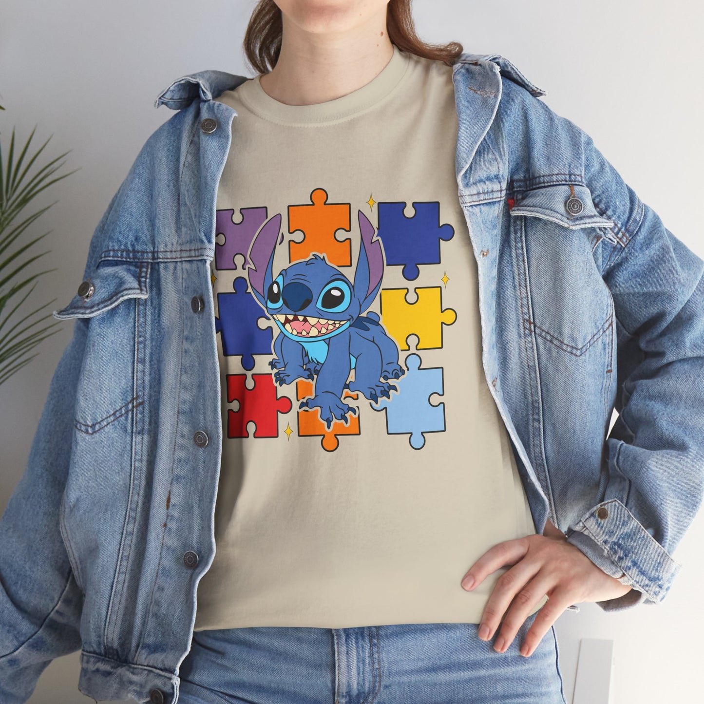 Puzzle Pieces Tee — Cute Blue Alien Character on Colorful Autism Puzzle Background
