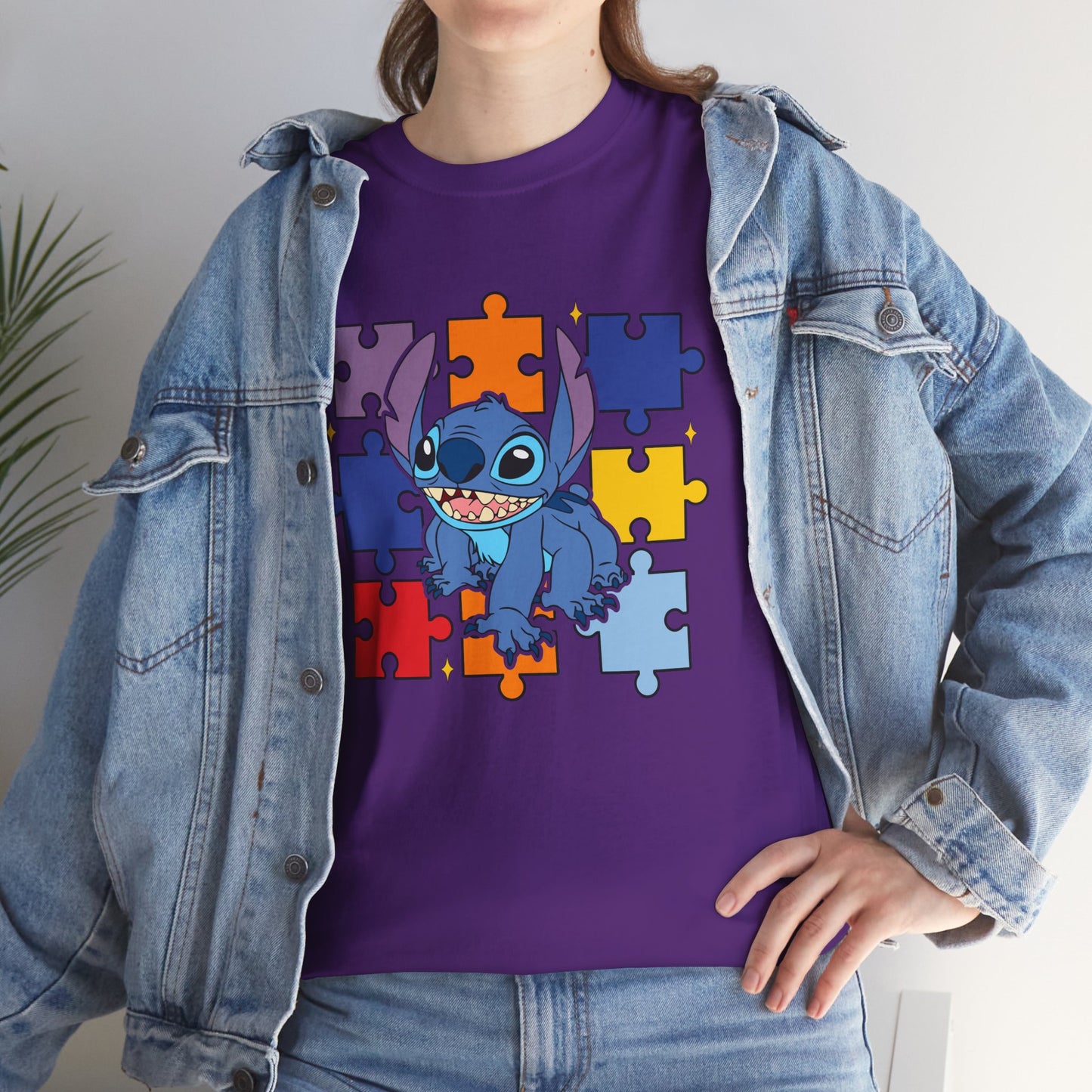 Puzzle Pieces Tee — Cute Blue Alien Character on Colorful Autism Puzzle Background