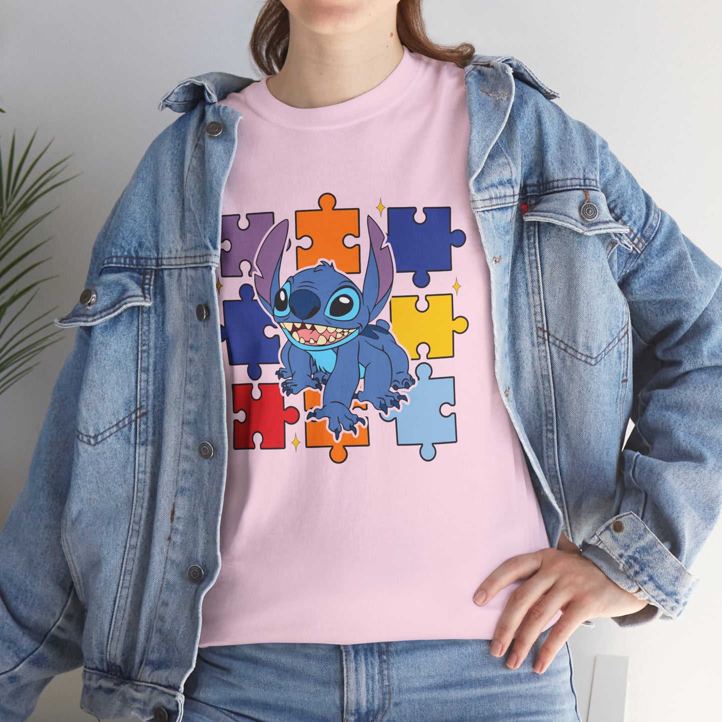 Puzzle Pieces Tee — Cute Blue Alien Character on Colorful Autism Puzzle Background