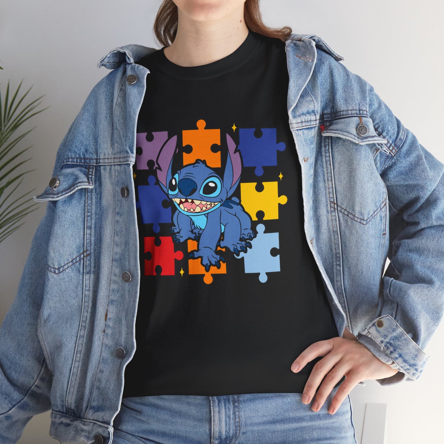 Puzzle Pieces Tee — Cute Blue Alien Character on Colorful Autism Puzzle Background